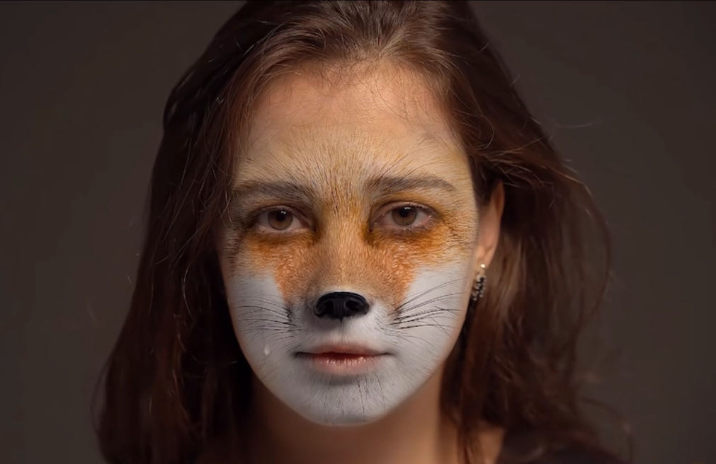 a girl swap her face into cartoon style by multiple face swap video website